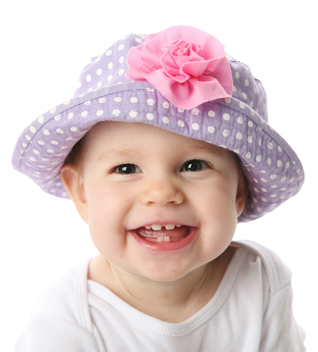 Baby Dentist Alabaster. A smiling baby in a cute purple hat displaying six new baby teeth.