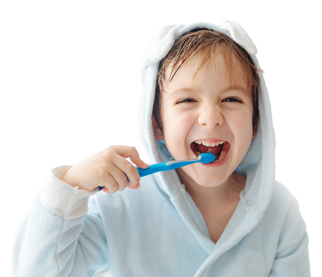 Preventative Pediatric Dental Care Alabaster AL. A happy toddler in pajamas smiles big and brushes his teeth