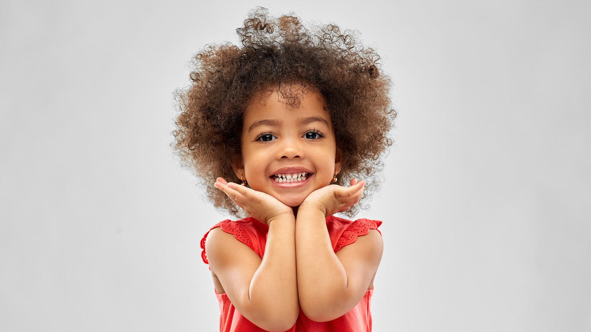 Regular dental visits keep children’s smiles healthy, yet anxiety can make appointments feel daunting. With thoughtful preparation and a supportive care team, most kids can learn to feel safe and confident at the dentist. This guide explores why dental fear happens, how to recognize it, and practical ways parents and dental professionals can create positive, low-stress visits. For families focused on managing dental fear in kids, the strategies below offer a clear path to calmer, more successful appointments. Understanding Dental Fear Dental fear and anxiety describe a child’s emotional and physical reactions to dental care, whether they’re thinking about an upcoming visit or sitting in the chair. The experience can range from mild nerves to significant distress, affecting cooperation during appointments and how consistently children receive preventive care. It’s useful to distinguish between fear and phobia. Fear is a common, situational response that often improves with reassurance, education, and positive experiences. A phobia is a more intense, persistent fear that leads to avoidance and distress even when a child understands there’s little actual danger. Phobias may require professional intervention to address effectively. Signs of dental anxiety can include trouble sleeping before the appointment, crying or tantrums when the visit is mentioned, clinginess, stomachaches, sweating, rapid breathing, withdrawal, or refusing to sit in the dental chair. Early recognition allows parents and dental teams to respond with supportive strategies tailored to the child’s needs and to focus on managing dental fear in kids with sensitivity and care. Causes of Dental Fear in Children Understanding the source of a child’s anxiety helps guide the right approach. One of the most common drivers is a previous negative dental experience, such as unexpected discomfort, a confusing sensation, or feeling rushed or unheard. Even a single difficult encounter can shape expectations and increase worry about future visits. Concerns about pain or discomfort are also common. Children may be uneasy about needles, drilling sounds, or unfamiliar tools. Sensory factors, such as a strong gag reflex or aversion to tastes and textures, can make routine cleanings and exams feel overwhelming. Parental attitudes matter too. Kids often mirror the emotions they see. When parents express anxiety or share upsetting dental stories, children may internalize those fears. Calm, matter-of-fact communication and modeling positive dental habits can reduce anxiety and build trust. Strategies for Easing Dental Fear Careful language and encouragement set a reassuring tone. Frame the visit around health and strength rather than problems. Avoid words that may trigger worry, such as “hurt,” “shot,” or “drill.” Use simple, positive terms like “clean,” “count,” and “make teeth strong.” Offer specific praise for cooperative behaviors, sitting in the chair, opening wide, and following instructions, to reinforce confidence. Visual tools and kid-friendly education can demystify the process. Picture books, short videos, and clear explanations help introduce tools and steps in a non-threatening way. Many pediatric practices use a “tell-show-do” approach: explain what will happen, show the instrument, then perform the action gently. This makes unfamiliar sensations predictable and less scary. Comfort items and coping techniques can make appointments easier. Encourage your child to bring a favorite stuffed animal, blanket, or small toy. Noise-reducing headphones or calming music can help children sensitive to sounds. Simple relaxation strategies like deep breathing, guided imagery, or counting games shift attention away from anxiety and foster a sense of control. These practical steps are central to managing dental fear in kids and building confidence over time. Use a calm, steady voice and offer choices when possible (e.g., “Would you like to hold your toy or listen to music?”). Break tasks into small steps, pausing for reassurance between each step. Set a reward plan ahead of time, small, predictable incentives reinforce successful visits. Practice at home by “playing dentist” to make basic behaviors familiar (opening wide, gently holding still). Preparing Your Child for Dental Visits Timing and routine make a difference. Schedule appointments when your child is typically well-rested and cooperative, mornings often work best. Avoid late-day visits when fatigue can increase stress. Keep meals and routines normal to minimize uncertainty. Discuss what to expect using clear, age-appropriate language a day or two before the visit. Keep explanations simple and positive: “The dentist will count your teeth, clean them, and help you keep your smile healthy.” Reassure your child that you’ll be nearby and that the dental team’s job is to help keep them comfortable and safe. Consider a brief pre-visit to the dental office. Meeting the team, seeing the waiting area, and sitting in the chair without treatment can turn a new environment into a familiar one. This acclimatization lowers anxiety and builds trust before the actual appointment. For families managing dental fear in kids, these previews can transform uncertainty into confidence. Age Group Preparation Tips What to Emphasize Toddlers (1–3) Short, simple explanations; bring a comfort item; practice “open wide” at home Gentle routines, familiar faces, quick visits Preschool (3–5) Use picture books and role-play; “tell-show-do” approach; small rewards Counting teeth, cleaning for strong smiles, choice of sticker School-age (6–9) Explain steps briefly; encourage questions; introduce coping techniques Being a helper, learning about tools, practicing breathing Preteens (10–12) Offer more detail; involve them in decisions; set goals and rewards Independence, healthy habits, partnering with the care team Creating a Positive Dental Experience Choosing a pediatric dentist is often the best option for anxious children. Pediatric dentists receive specialized training in child development, communication, and behavior guidance, and their practices are designed around kids’ comfort. Many general dentists are also experienced with children, ask about their approach to anxiety, coping techniques, and accommodating sensory needs. A child-friendly environment supports calmer visits. Look for offices with welcoming decor, kid-sized equipment, and staff who speak to children directly and respectfully. Gentle pacing, short breaks, and clear explanations help children feel informed and empowered throughout the visit. Adding fun elements can keep appointments engaging and positive. Sticker charts, treasure boxes, and small rewards reinforce cooperation and help children associate dental care with success. Waiting areas with books, toys, or interactive screens can reduce nerves before the appointment. Some practices use themed rooms, storytelling, or playful metaphors to make procedures understandable and less intimidating. Ask the office about scheduling extra time for gradual desensitization for highly anxious children. Request consistent providers when possible so your child builds rapport with familiar faces. Share any relevant information about your child’s sensitivities, medical history, or preferred coping techniques. Agree on signals your child can use to request a pause during a procedure. When to Seek Professional Help Dental fear may be transitioning into a phobia if a child experiences intense panic, persistent avoidance, or severe distress that doesn’t improve with supportive strategies. Warning signs include refusing all dental care, pronounced physical symptoms like vomiting or shaking, or overwhelming worry well in advance of appointments. Speak with your dental team about anxiety management options. Pediatric dentists can adapt techniques, extend visit times for gradual exposure, and use behavior guidance strategies such as modeling and positive reinforcement. For certain procedures, they may discuss nitrous oxide (laughing gas) or other minimal sedation options when appropriate and safe, always with parent consent and careful monitoring. For severe or longstanding anxiety, consider therapeutic support. Cognitive behavioral therapy (CBT) helps children identify fearful thoughts and replace them with coping skills. Child psychologists and therapists can collaborate with dentists to create step-by-step exposure plans that build tolerance over time. Parent coaching and community resources can offer additional tools and ongoing support. Early, compassionate intervention promotes lifelong comfort with dental care and supports families in managing dental fear in kids. Helping Your Child Build Long-Term Confidence Consistency and positive reinforcement help children move from anxious visits to confident care. A supportive partnership among parents, dentists, and staff reduces stress and encourages healthy habits. Keep regular checkups to maintain familiarity and prevent problems that require more complex treatment. Celebrate progress, even small wins like sitting in the chair or trying a new coping technique. Model calm behavior and speak positively about dental care at home. Use predictable routines: the same dentist, similar appointment times, and clear, reassuring explanations. Encourage daily brushing and flossing so children feel in control of their oral health. Managing Dental Fear in Kids